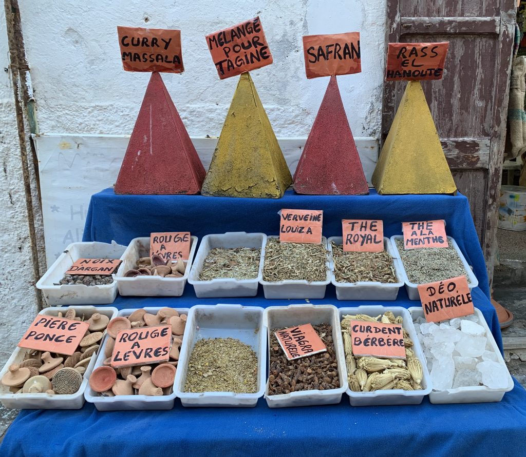 Spices displayed for sale in Essaouria. Part of a post on how to travel gluten free in Morocco